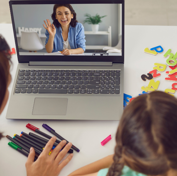 Kids in a video call with their Spanish teacher